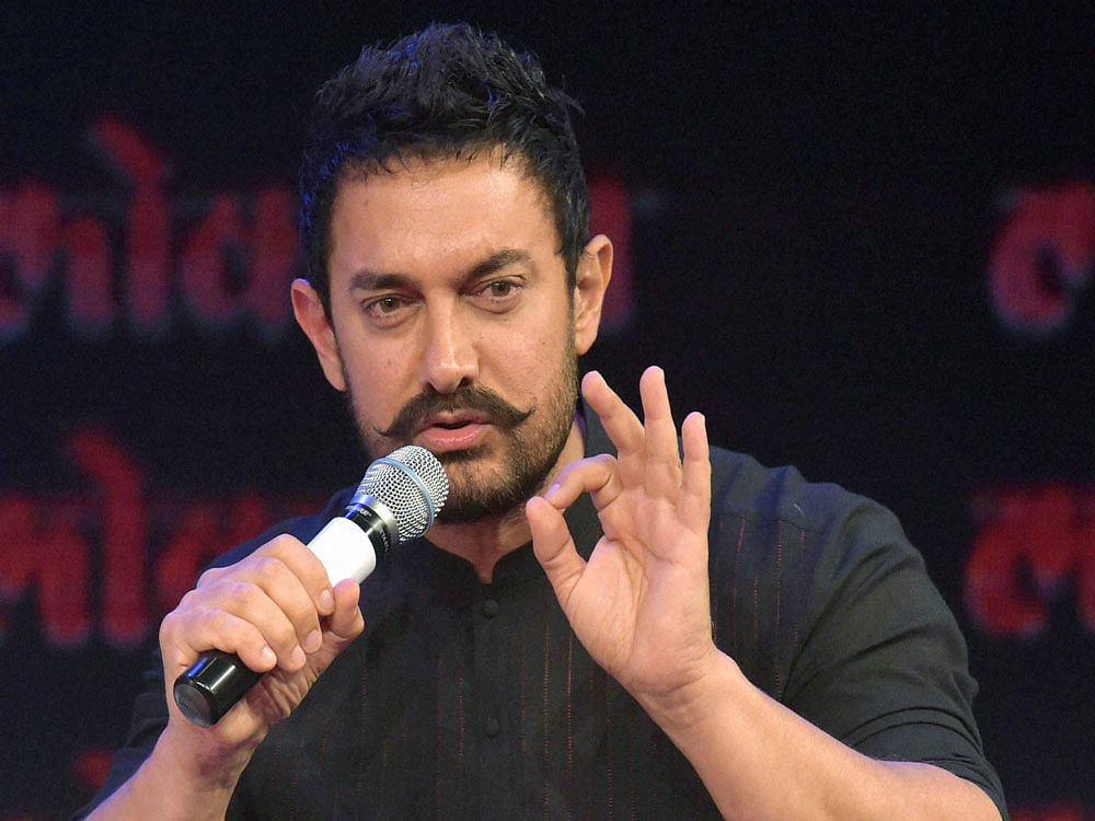 The 51-year-old Dhoom 3 actor said children bring special happiness in the lives of parents and he experienced that when he had his first child, Junaid. pti file photo