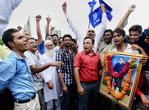 Members of Dalit community shout slogans at a protest rally in Ahmedabad on Friday against the recent attack on Dalits at Una. PTI file Photo