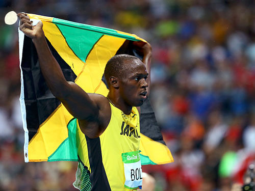 History-maker Usain Bolt said he deserves to be among sport's all-time greats after romping to a third straight Olympic 200m gold. Reuters photo
