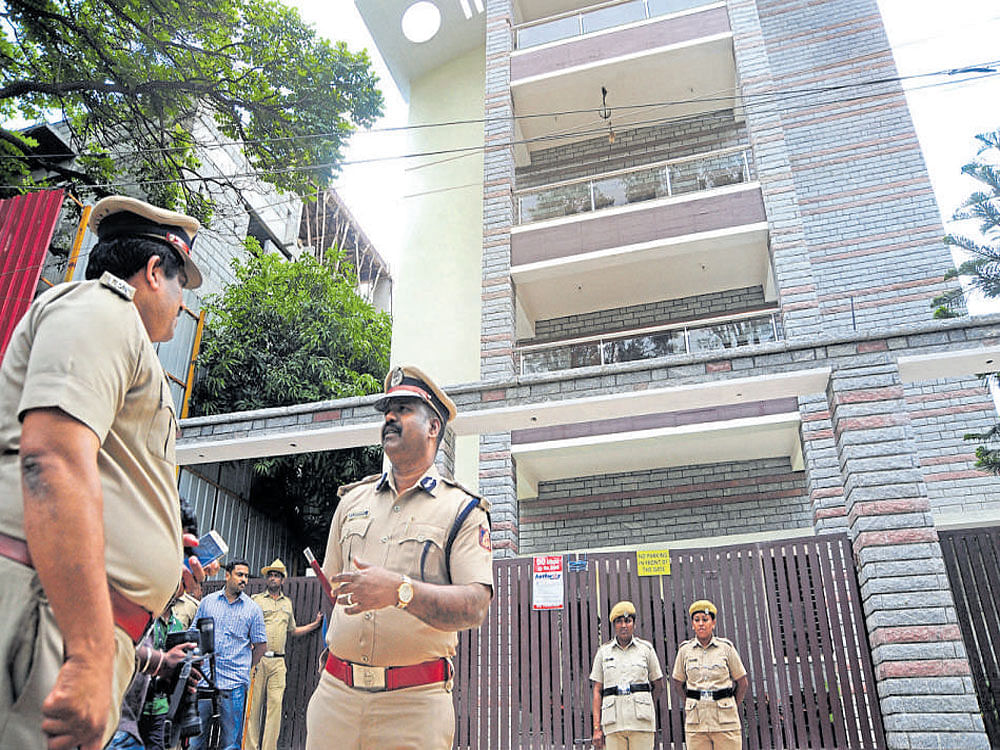 Police heighten security at the office of Amnesty International India in Bengaluru on Friday. DH photo