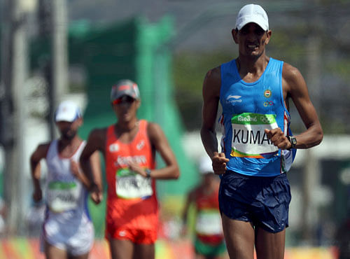 Athletics - Final - Men's 50km Race Walk - Pontal - Rio de Janeiro, Brazil - 19/08/2016. Sandeep Kumar (IND) of India during the last lap. REUTERS