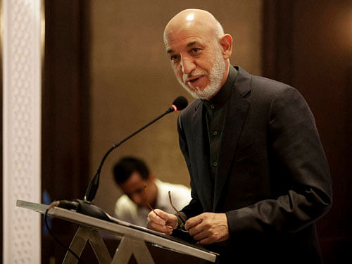 Afghanistan's former president Hamid Karzai speaks on 'Regional Power Play and the Rise of Radicalism in Afghanistan' in New Delhi on Saturday. The event was organized by Institute of Peace and Conflict Studies, an India based think tank. PTI Photo