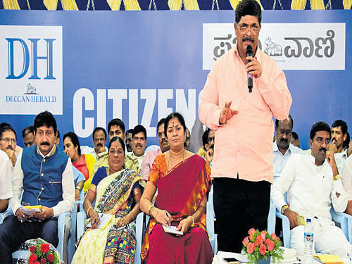 Mahalakshmi LayoutMLAKGopalaiah speaks at the 'Citizens for Change' organised byDeccan Herald andPrajavani on Saturday. DH Photo.