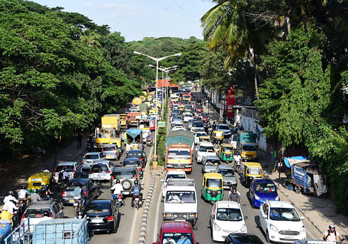 Traffic came to a standstill on Palace Road in the city on Saturday due to protests by various organisations. DH PHOTO