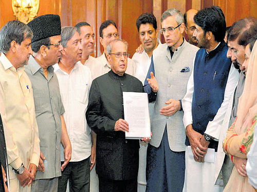 President Pranab Mukherjee with a delegation of leaders of Opposition parties from Jammu and Kashmir in New Delhi on Saturday. PTI