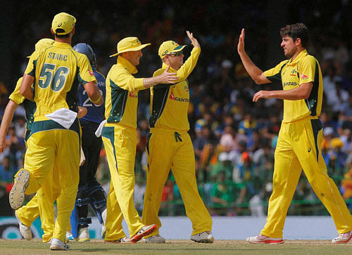 Australia's Moises Henriques, right, celebrates the wicket of Sri Lanka's Tillakaratne Dilshan with his teammates during their first one day international cricket match in Colombo, Sri Lanka, Sunday, Aug. 21, 2016. AP/PTI