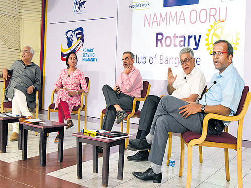 (From left) Panellists V Ravichander, Shubha Ramachandran, Ashwin Mahesh, Naresh Narashimhan and Harish Narasappa at a panel discussion on 'Namma Ooru' at Rotary Hall, organised by Rotary Club, in Bengaluru on Monday.  dh photo