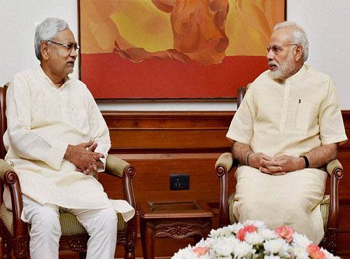 Prime Minister Narendra Modi with Chief Minister of Bihar Nitish Kumar at a meeting to discuss flood situation in the State, in New Delhi on Tuesday. PTI Photo