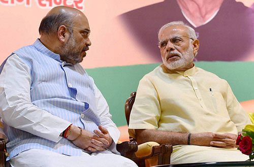 Prime Minister Narendra Modi with BJP president Amit Shah at the concluding session of party's core committee meeting of all state units in New Delhi on Tuesday. PTI Photo
