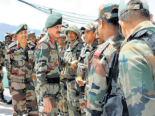 Taking stock of situation: Army chief Gen Dalbir Singh Suhag meets army officers during his visit to Kashmir on Tuesday to review the security situation. PTI