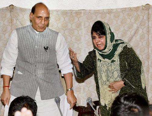 Union Home Minister Rajnath Singh and Jammu and Kashmir chief minister Mehbooba Mufti interact with media during a press conference in Srinagar on Thursday. PTI Photo