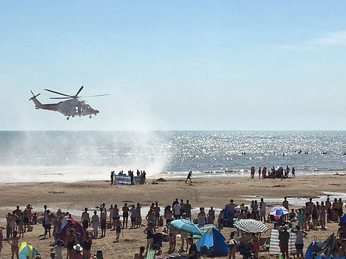 Three of the victims were airlifted from sea yesterday and two other bodies were discovered washed ashore later the same day at a popular beach resort of Camber Sands in East Sussex. Screengrab