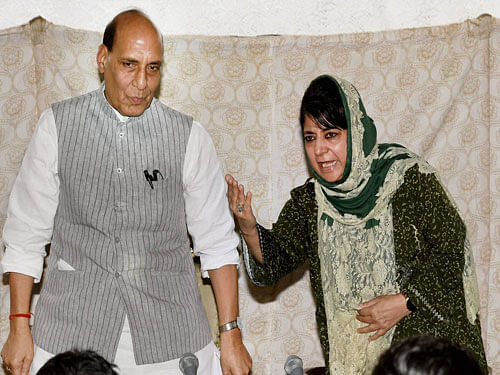 Union Home Minister Rajnath Singh and Jammu and Kashmir chief minister Mehbooba Mufti interact with media during a press conference in Srinagar on Thursday. PTI Photo