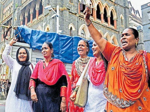 equality prevails: Bharatiya Muslim Mahila Andolan members celebrate after the Bombay High Court allowed women's entry into the sanctum sanctorum of the Haji Ali Dargah in Mumbai on Friday. Pti