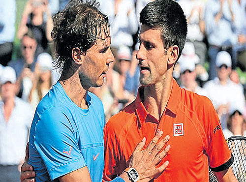MOUTH WATERING Rafael Nadal (left) and Novak Djokovic are drawn to meet in the semifinal of the US Open. FILE PHOTO