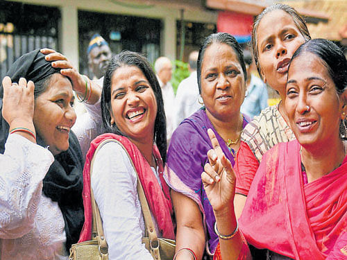Women celebrate after the Bombay High Court's ruling  on Friday. Pti