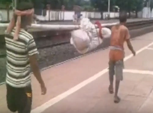 Salamani Behera, an 80-year-old widow was run over by a goods train near Soro railway station in Balasore district on Wednesday. Her body was taken to the community health centre. But the GRP personnel reached there after 12 hours. Screen grab