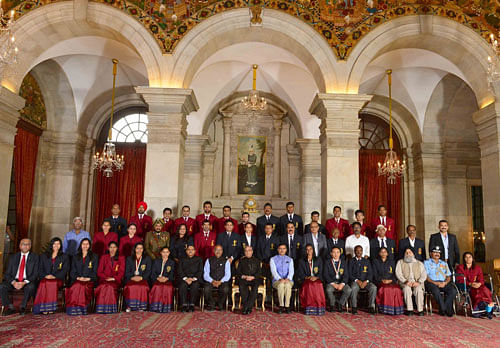 President Pranab Mukherjee poses for photo with athletes after National Sports & Adventure Awards function at Rashtrapati Bhavan today. Photo courtesy: Rashtrapati Bhavan/Twitter