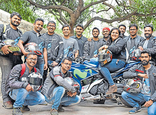 enthusiastic (Standing, from left) Dempsy, Sachin, Abhishek, Saurabh, Avinash, Mustaqeem, Sauban, Saquib, Sojan and Sounak. (Sitting) Yogesh, Arnab and Ronnie.  (On the bike) Sonali. DH PHOTO BY S K DINESH