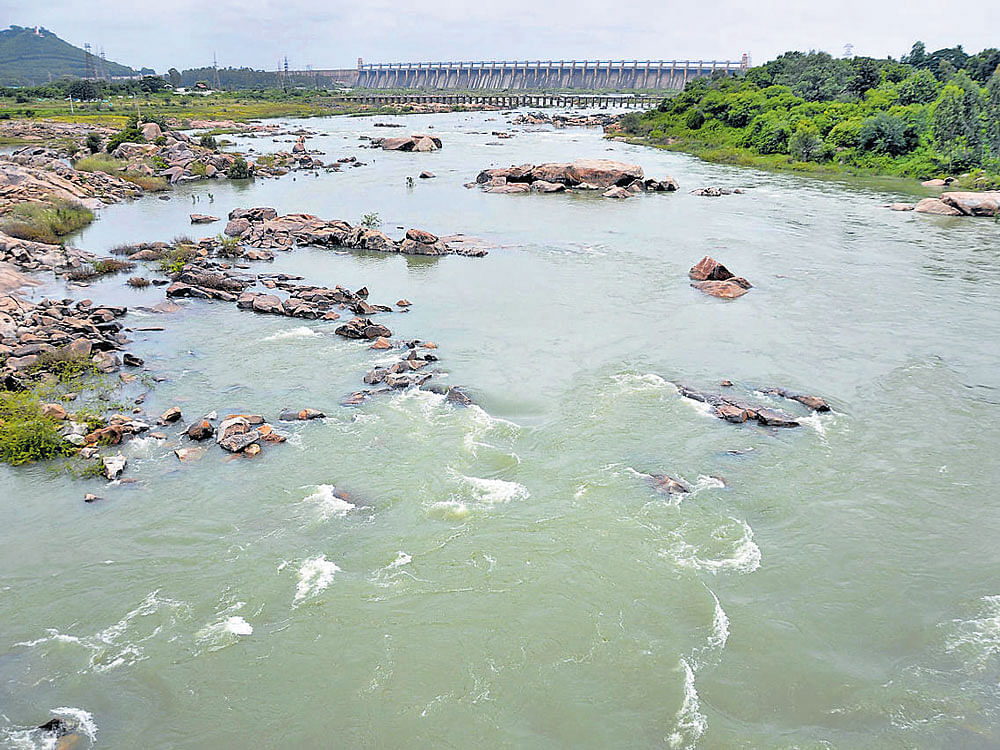Water being released from the Tungabhadra dam to Andhra Pradesh on Wednesday. DH photo