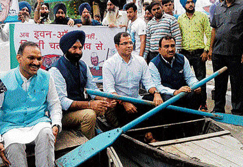 West Delhi MP Parvesh Verma protests with boats outside Delhi Secretariat to highlight the failure of the AAP government to handle water-logging in the city.