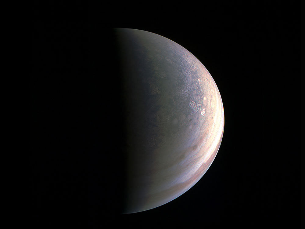 The images were taken during the solar powered spacecraft's first flyby of the planet with its instruments switched on. Juno successfully executed the first of 36 orbital flybys on August 27 when the spacecraft came about 4,200 kilometres above Jupiter's swirling clouds. Reuters photo