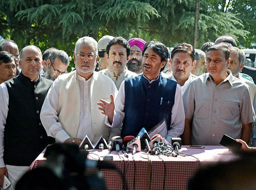 JKPCC president G A Mir addressing a press conference after a meeting with the All Party Parliamentary Delegation at SKICC in Srinagar on Sunday. PTI Photo