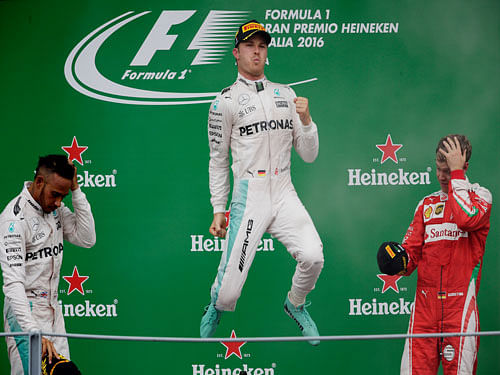 Mercedes' Nico Rosberg celebrates his win on the podium after the race.Reuters Photo.