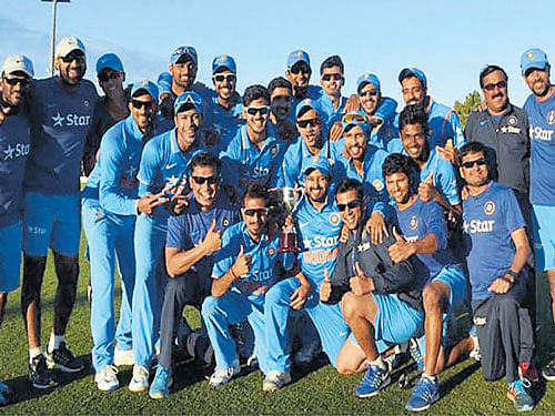 CHAMPIONS India 'A' players celebrate after defeating Australia 'A' in the final of the Quadrangular one-day series in Mackay on Sunday. BCCI