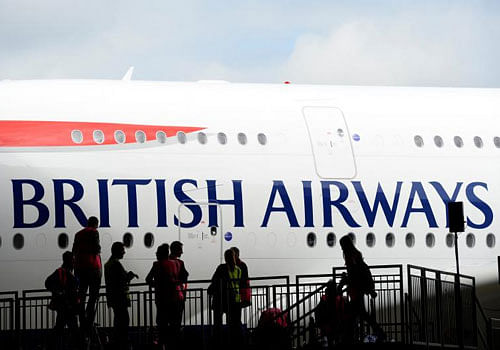 BA, owned by International Consolidated Airlines Group, apologized to customers for the delays and urged passengers to check in online before they reached the airport. Reuters file photo