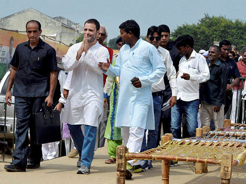Congress Vice President Rahul Gandhi at 'Khat pe charcha' programme for the launch of his Kisan Yatra for upcoming UP polls, in Deoria on Tuesday. PTI Photo