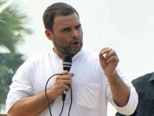 Congress Vice President Rahul Gandhi addressing the Khat Sabha organised as part of his Kisan Yatra in Deoria on Tuesday. PTI Photo