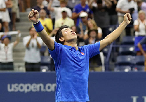 Kei Nishikori celebrates after his match against Andy Murray. Mandatory Credit: Geoff Burke-USA TODAY Sports/ Reuters