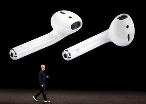 AirPods are displayed as Apple Inc CEO Tim Cook makes his closing remarks during an Apple media event in San Francisco, California, U.S. September 7, 2016. REUTERS