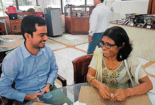 Blood stem cell donor Akash Grover talks with the recipient Manju Sharma in New Delhi  on Friday. DH PHOTO