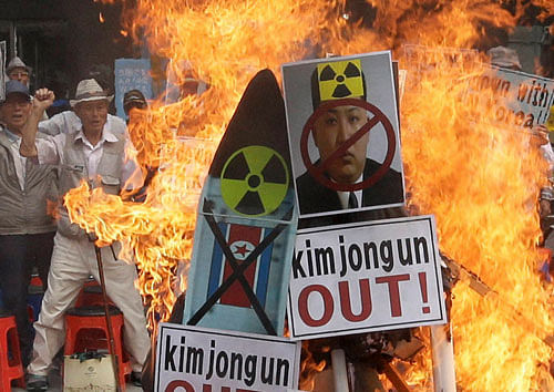 A defaced image of North Korean leader Kim Jong Un is burned by South Korean protesters during a rally denouncing North Korea's latest nuclear test, in Seoul, South Korea, Saturday, Sept. 10, 2016. The U.N. Security Council is strongly condemning North Korea's latest nuclear test and says it will start discussions on 'significant measures' against Pyongyang including new sanctions. AP/PTI