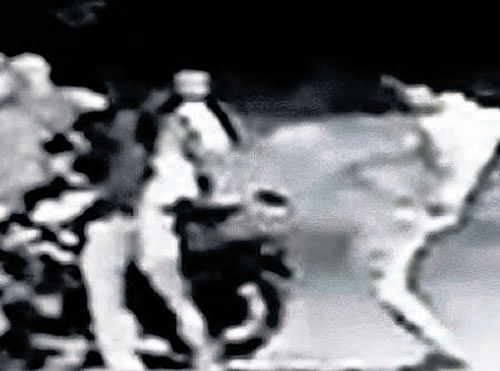 The video grab of cop beating a youth near Pipeline Road in Kaggalipura.