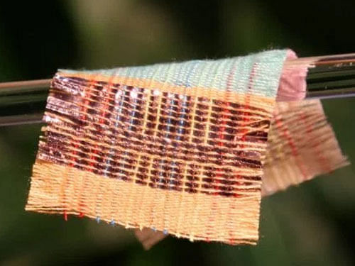 The new fabric, which is 320 micrometres thick woven together with strands of wool, could be integrated into tents, curtains or wearable garments, Wang said. Image courtesy Facebook.