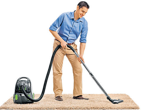 spic & span A vacuum cleaner enables cleaning of furniture, hard to reach nooks and crannies of the wall and floor.