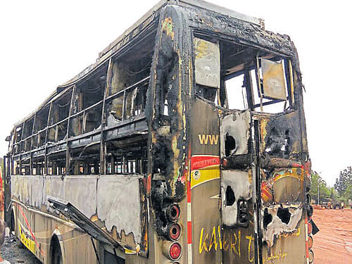 The sleeper coach bus, which was damaged in fire near Humnabad town of Bidar district in the early hours of Friday.