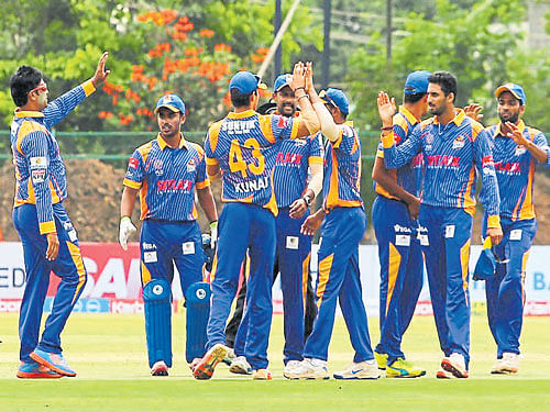 Jubilant: Hubli Tigers celebrate after taking a Namma Shivamogga wicket on Saturday.