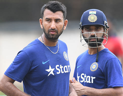 Composed: Cheteshwar Pujara (left) and Ajinkya Rahane will hope to bring stability to the Indian middle order. DH FILE&#8200;PHOTO