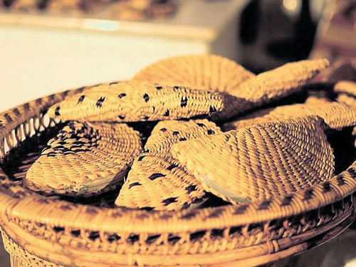 Water reed purses and a flower vase.