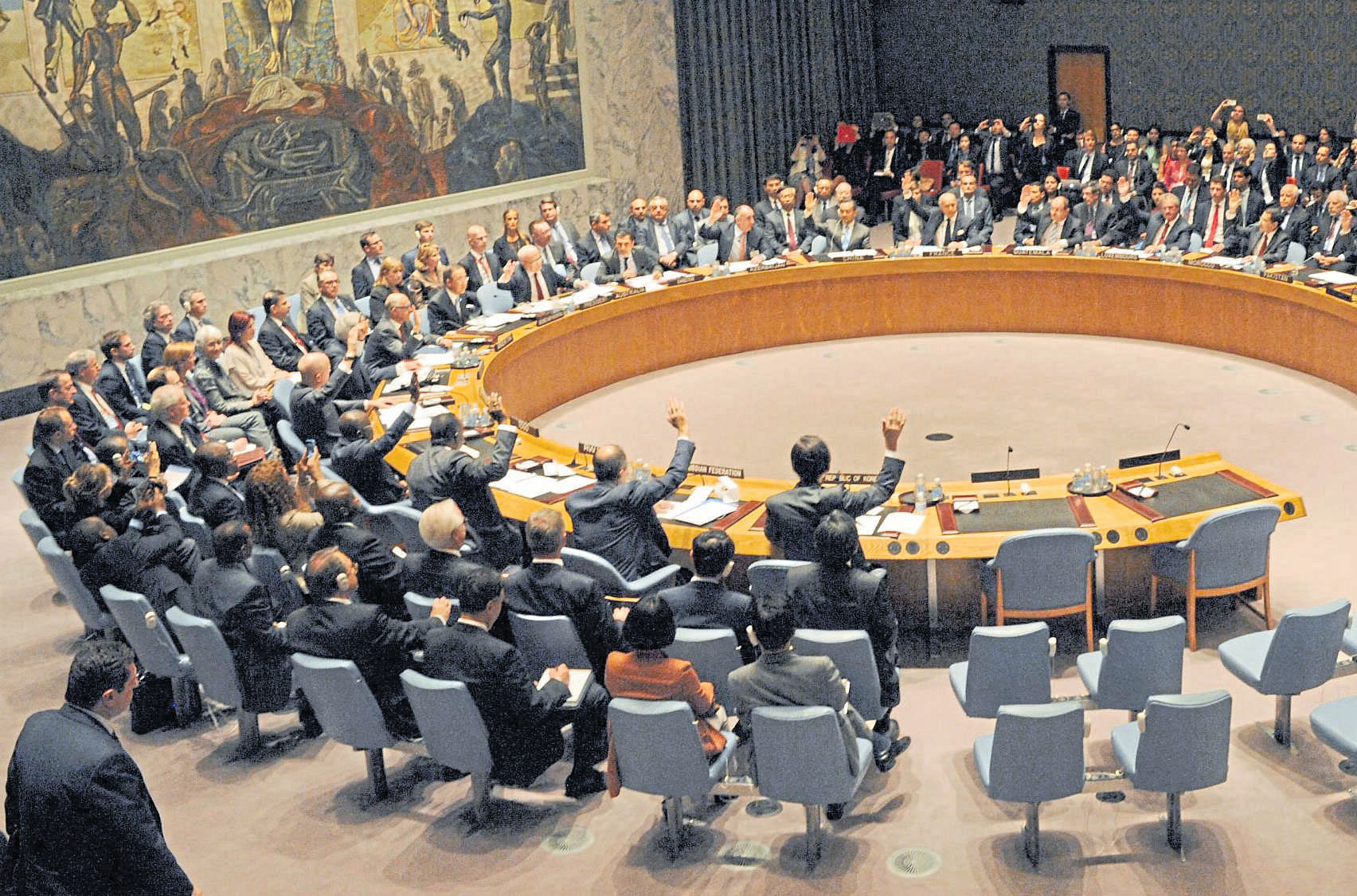 Members of the United Nations Security Council vote for a resolution during the 68th UN General Assembly in New York in 2013. The 15-member UNSC is by far the most powerful arm of the UN, but critics say it is also the most anachronistic.  REUTERS