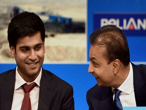 Chairman Reliance infrastructure Anil Ambani and his son Jai Anmol Ambani during the Reliance capital AGM in Mumbai on Tuesday. PTI Photo