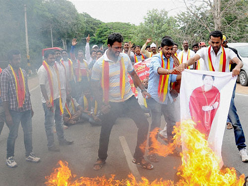 They blocked the Mysuru-Bengaluru highway at Mandya, Maddur and Srirangapatna and vented their ire against the apex court's  order.  pti file photo