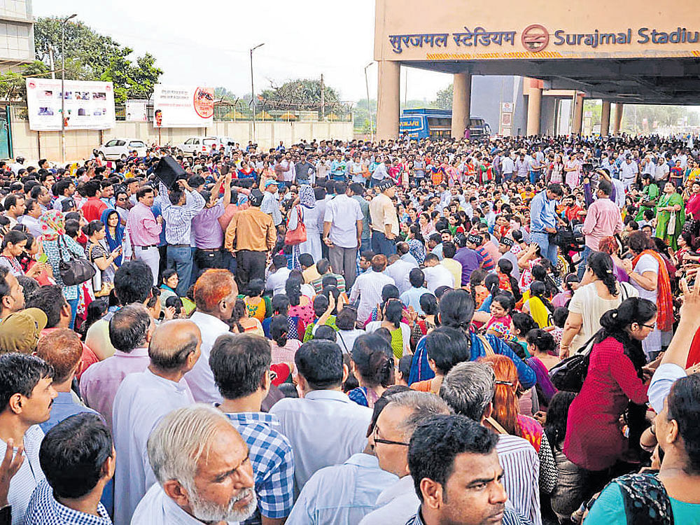 Teachers protest killing of their colleague by two students, in New Delhi on Tuesday. DH