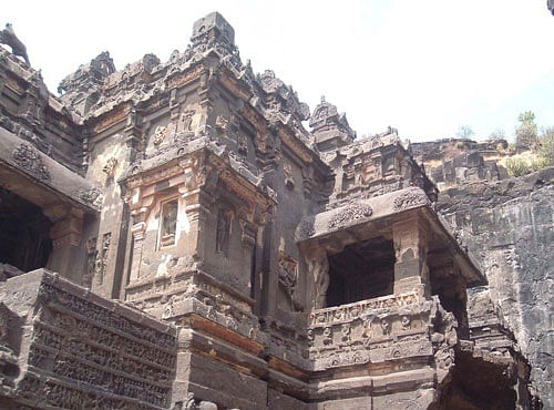 Of the 14 Ellora caves, the first 12 have monuments and artwork of Buddhism, while the remaining two have structures and artwork pertaining to Hinduism. Eleven out of the 12 Buddhist caves include rock-cut monasteries with prayer halls and large and multi-storeyed buildings that include living and sleeping quarters, kitchens and other rooms. The monastery caves have shrines with carvings of Gautama Buddha, Bodhisattvas and other saints.  DH file photo