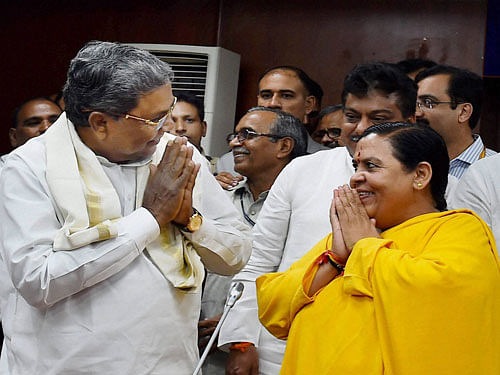 Union Minister for Water Resources, River Development and Ganga Rejuvenation, Uma Bharti with the Chief Minister of Karnataka, Siddaramaiah during a meeting on Cauvery issue in New Delhi on Thursday. PTI Photo