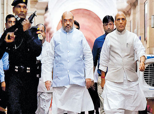 Home Minister Rajnath Singh and BJP president Amit Shah arrive for an all-party meeting in New Delhi on Thursday. PTI